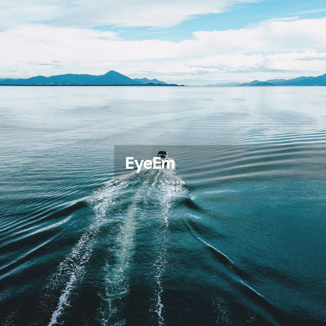 Boat in sea against sky