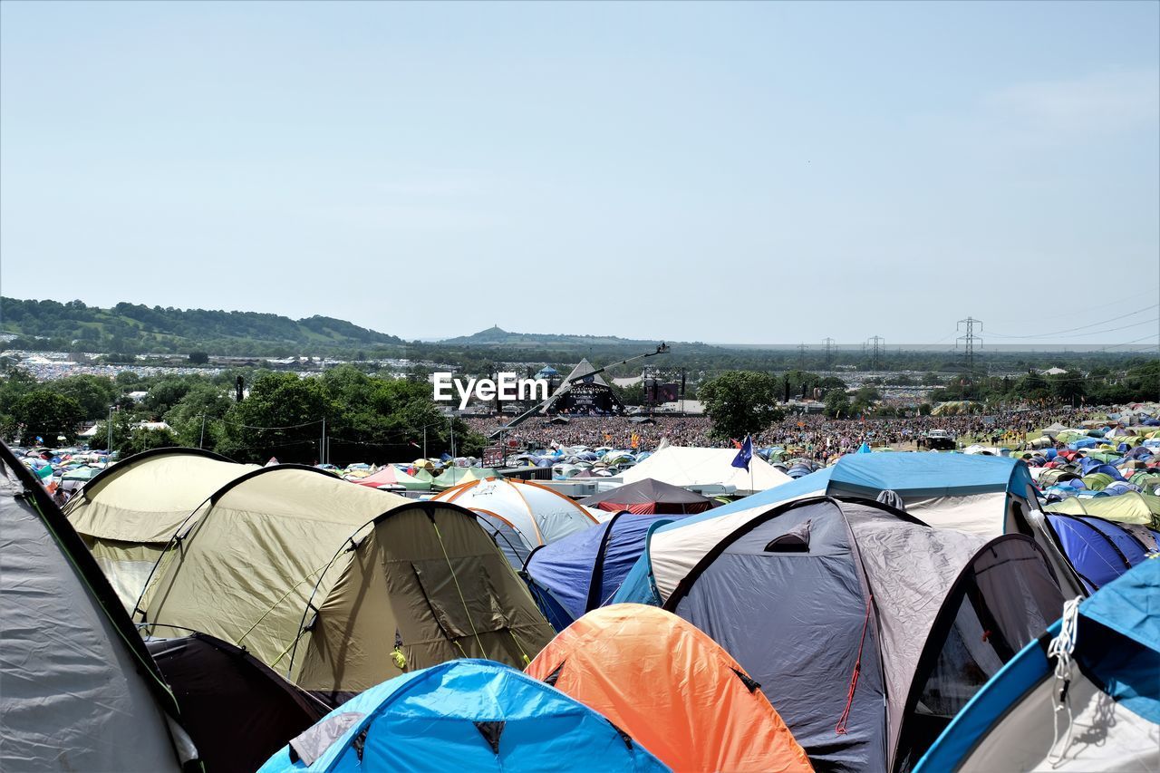 Colorful tents against clear sky