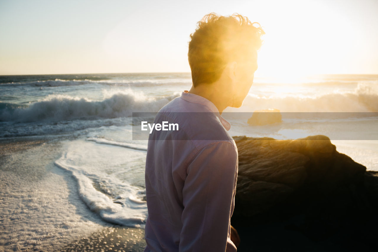 Side view of man at beach