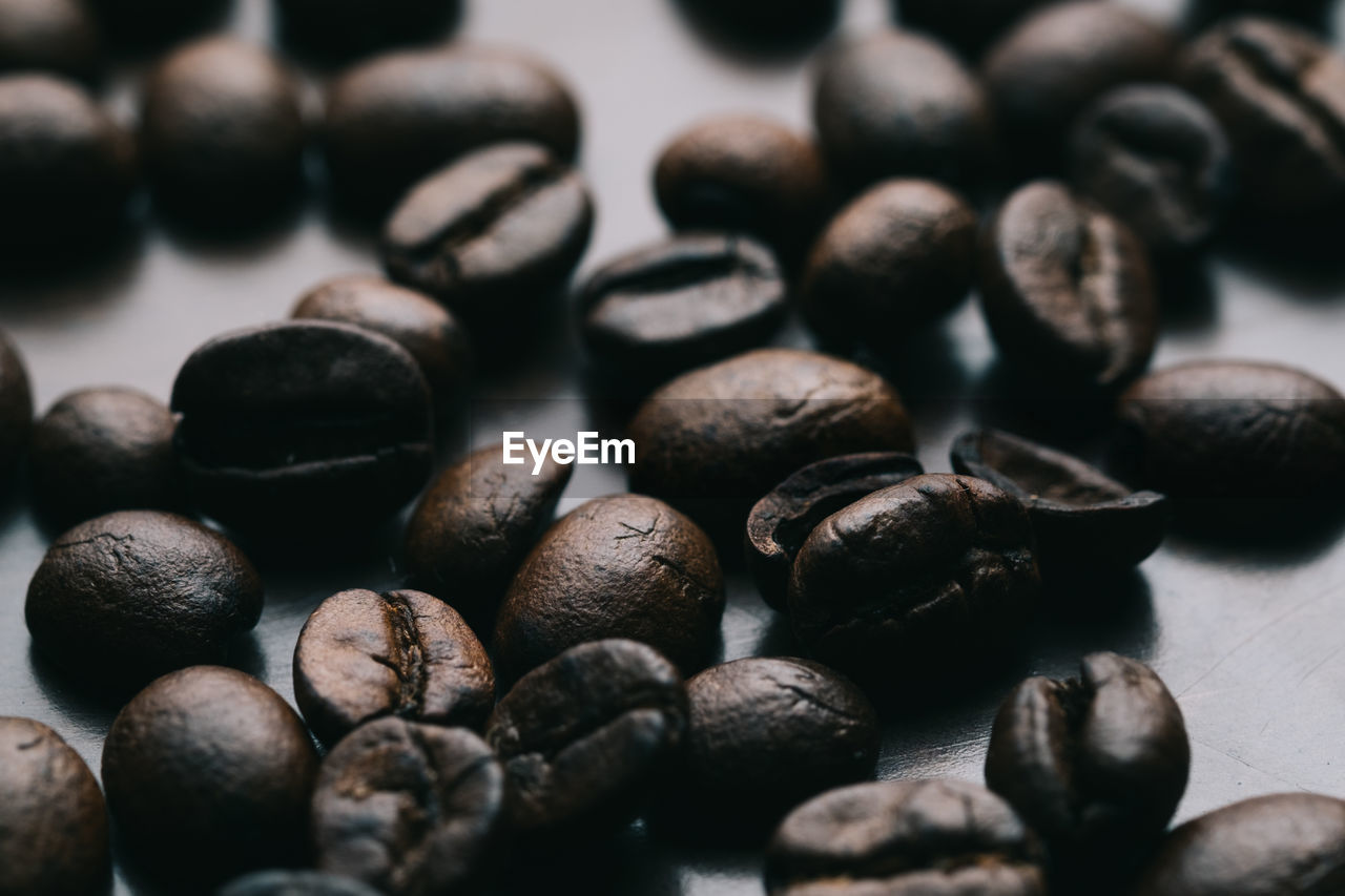 FULL FRAME SHOT OF COFFEE BEANS IN GLASS