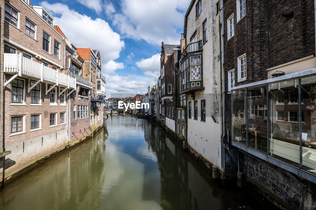 canal amidst buildings