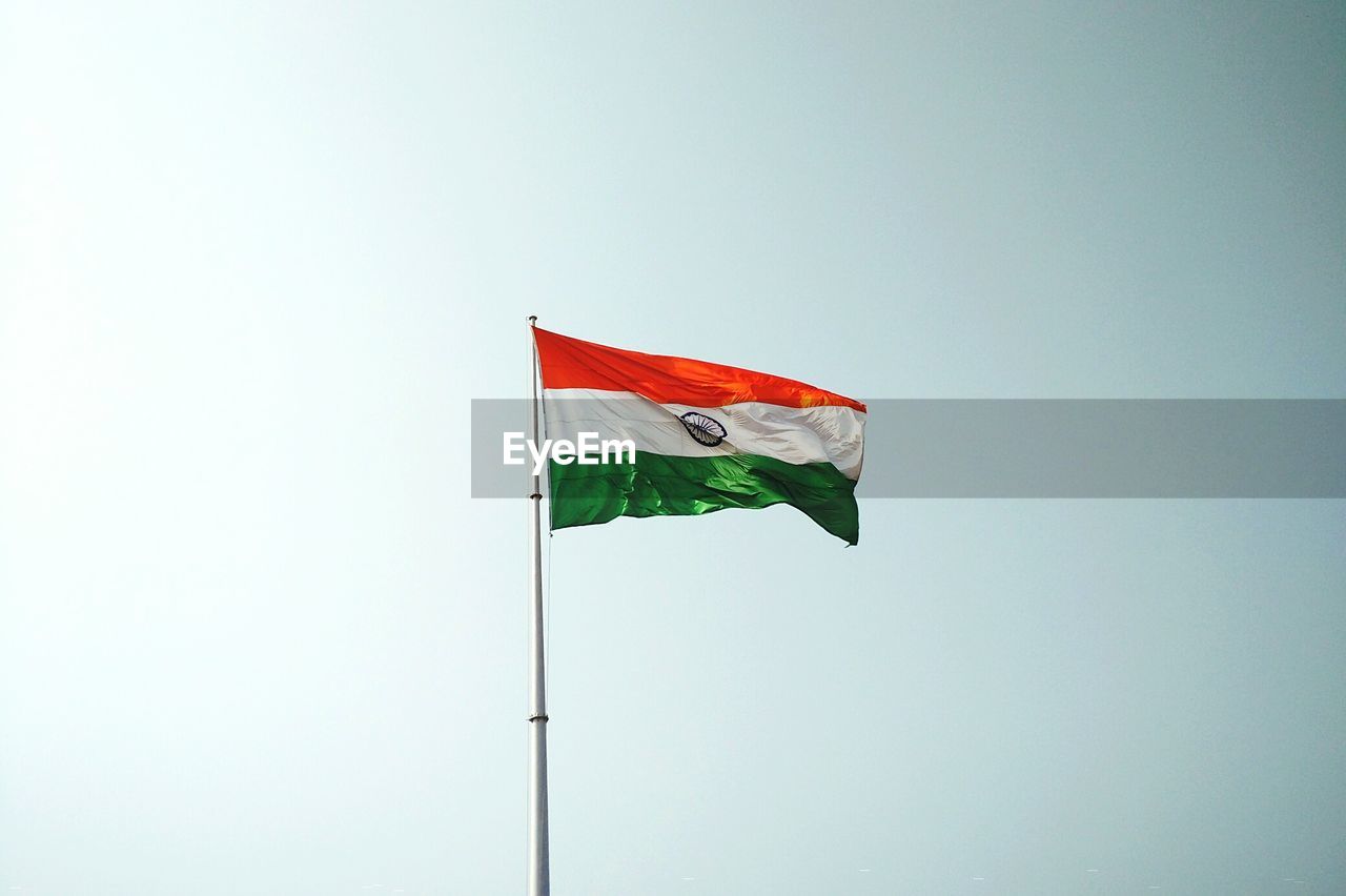 Low angle view of the flag of india against clear sky