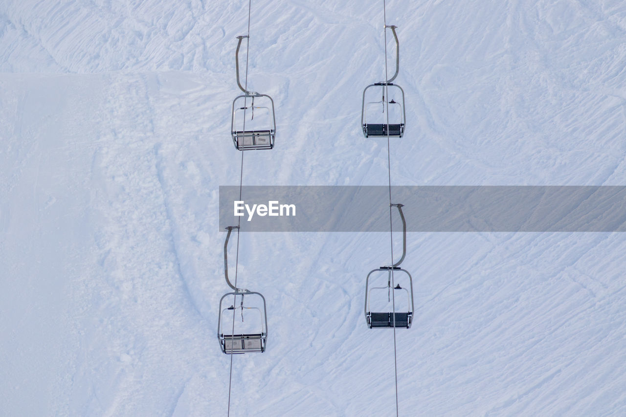 Low angle view of ski lifts 