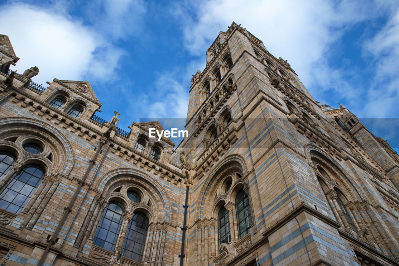 Low angle view of the facade of natural history museum of london, united kingdom.