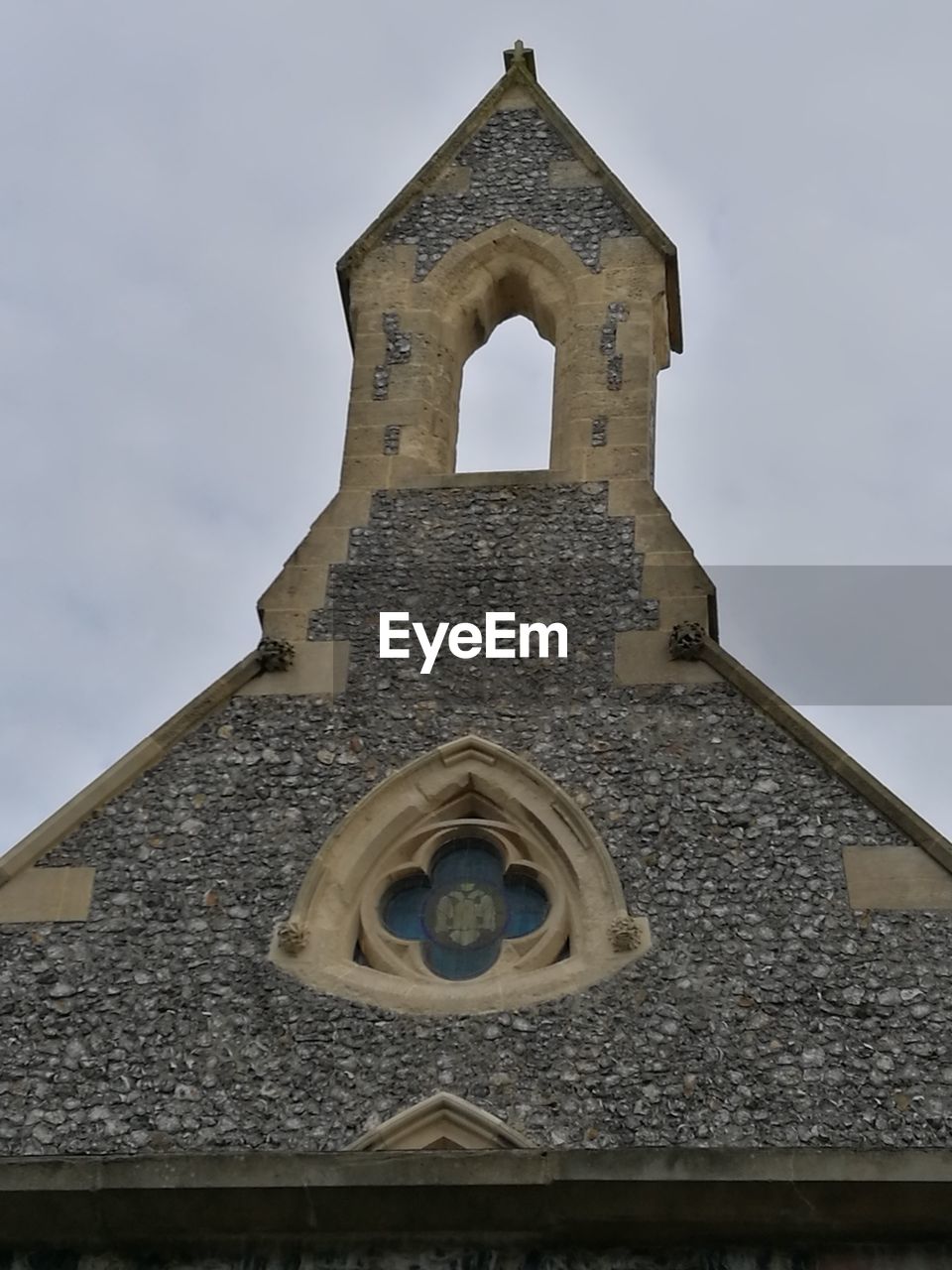 LOW ANGLE VIEW OF CROSS AGAINST SKY