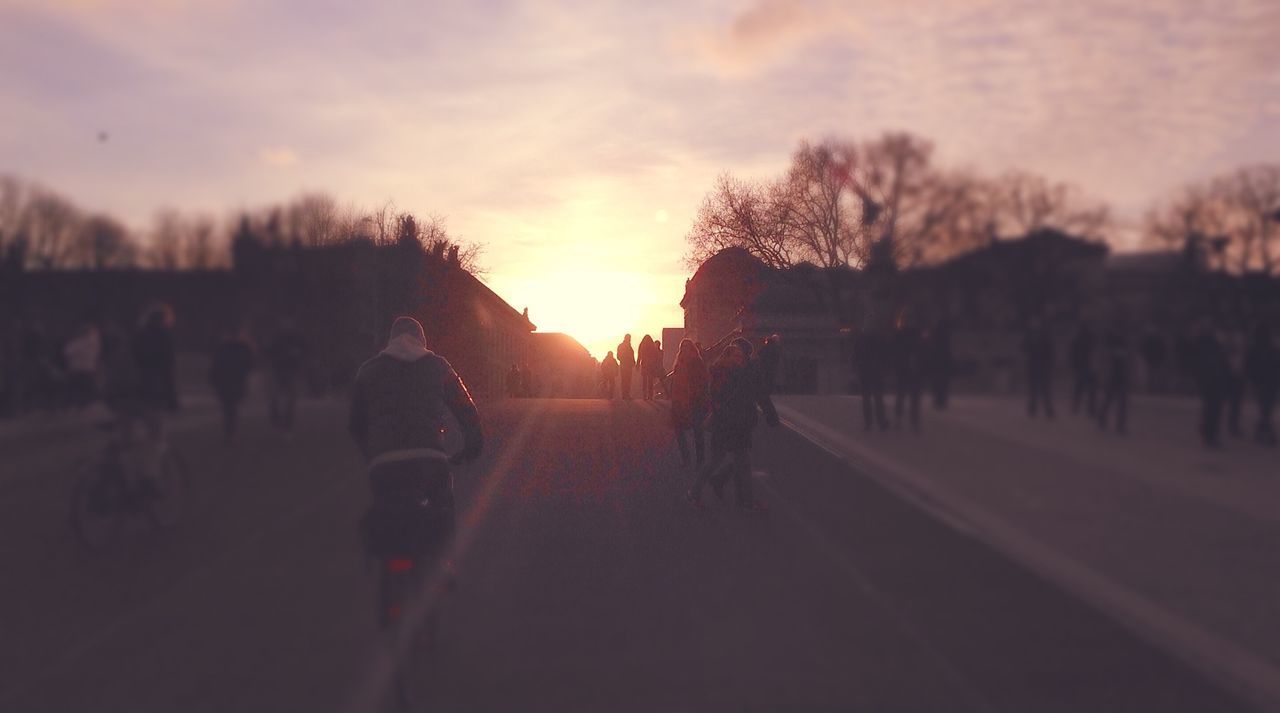 Group of people walking on road