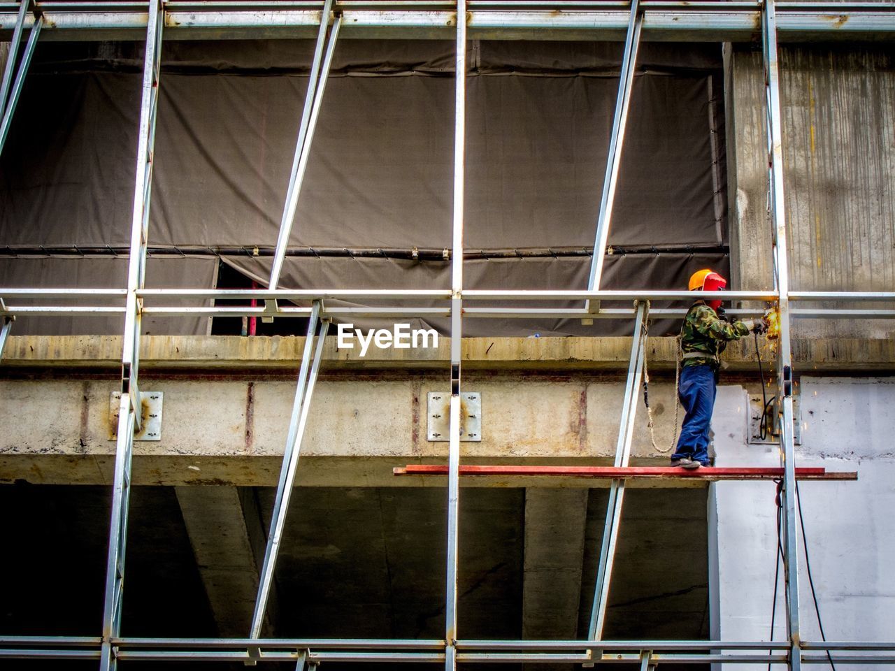 Low angle view of worker at construction site