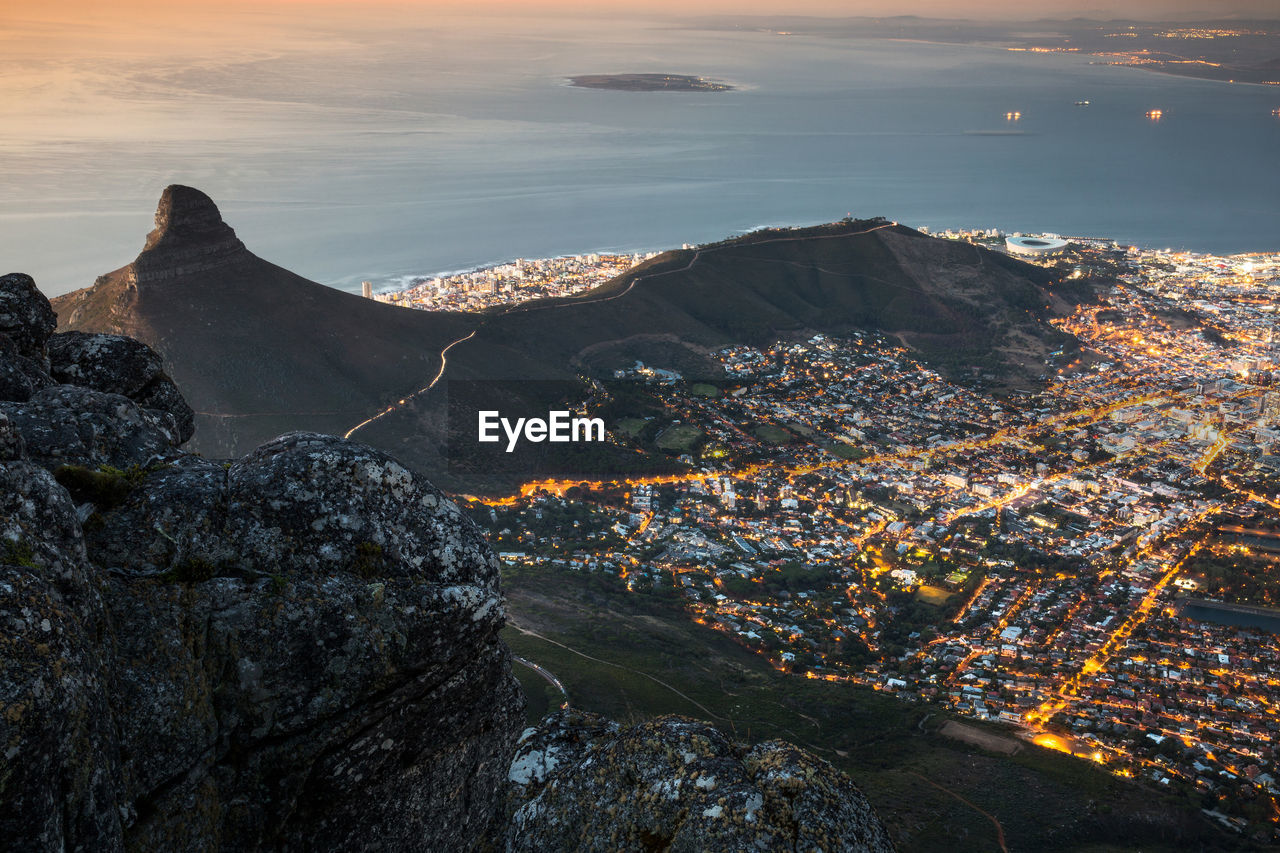 High angle shot of town against calm sea