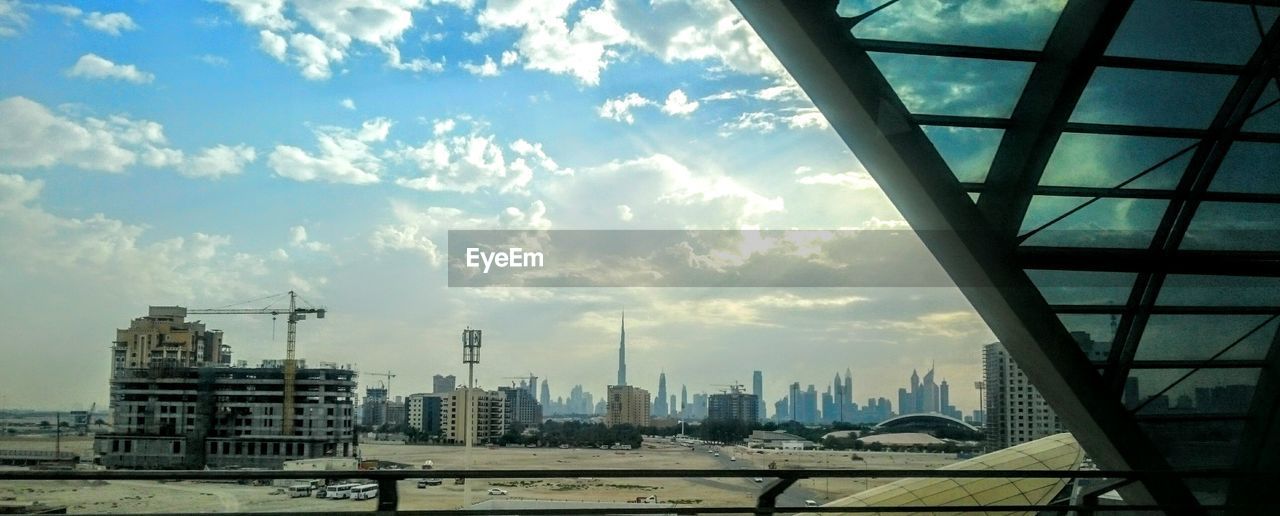 VIEW OF CITYSCAPE AT DUSK