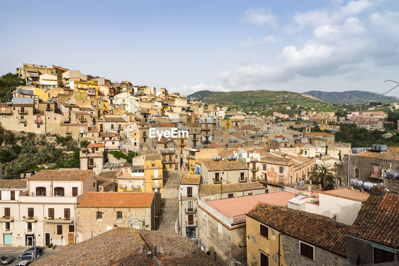 High angle shot of townscape against sky