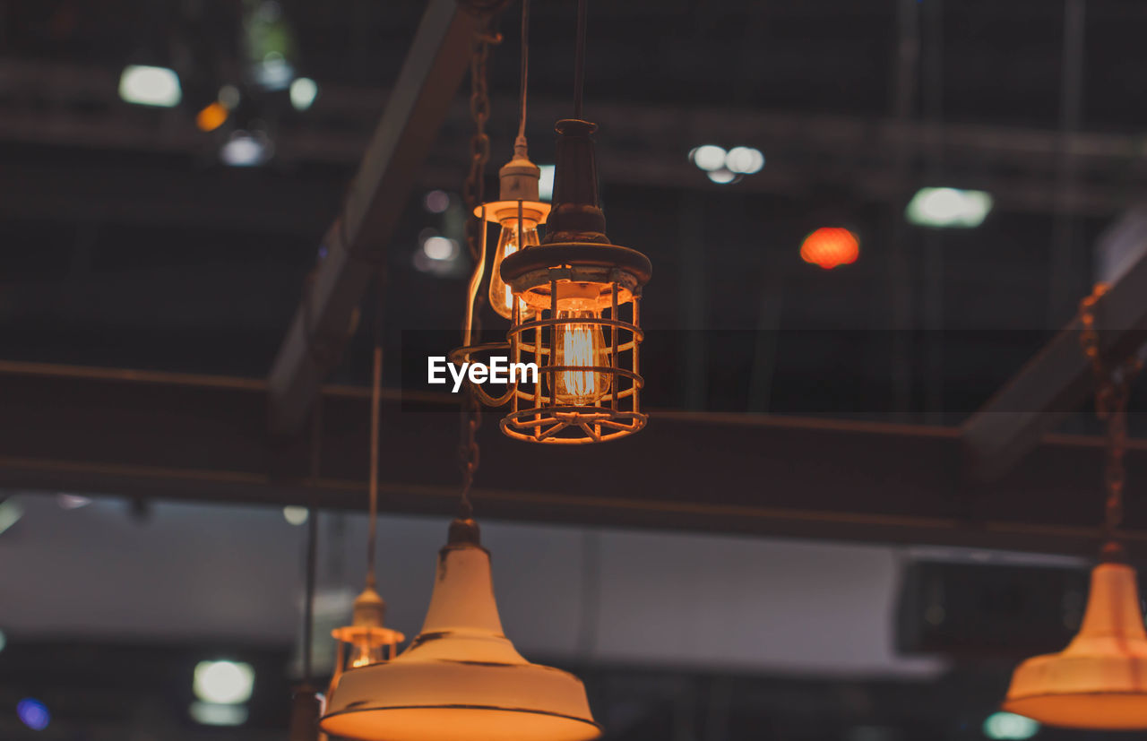 Low angle view of illuminated pendant light