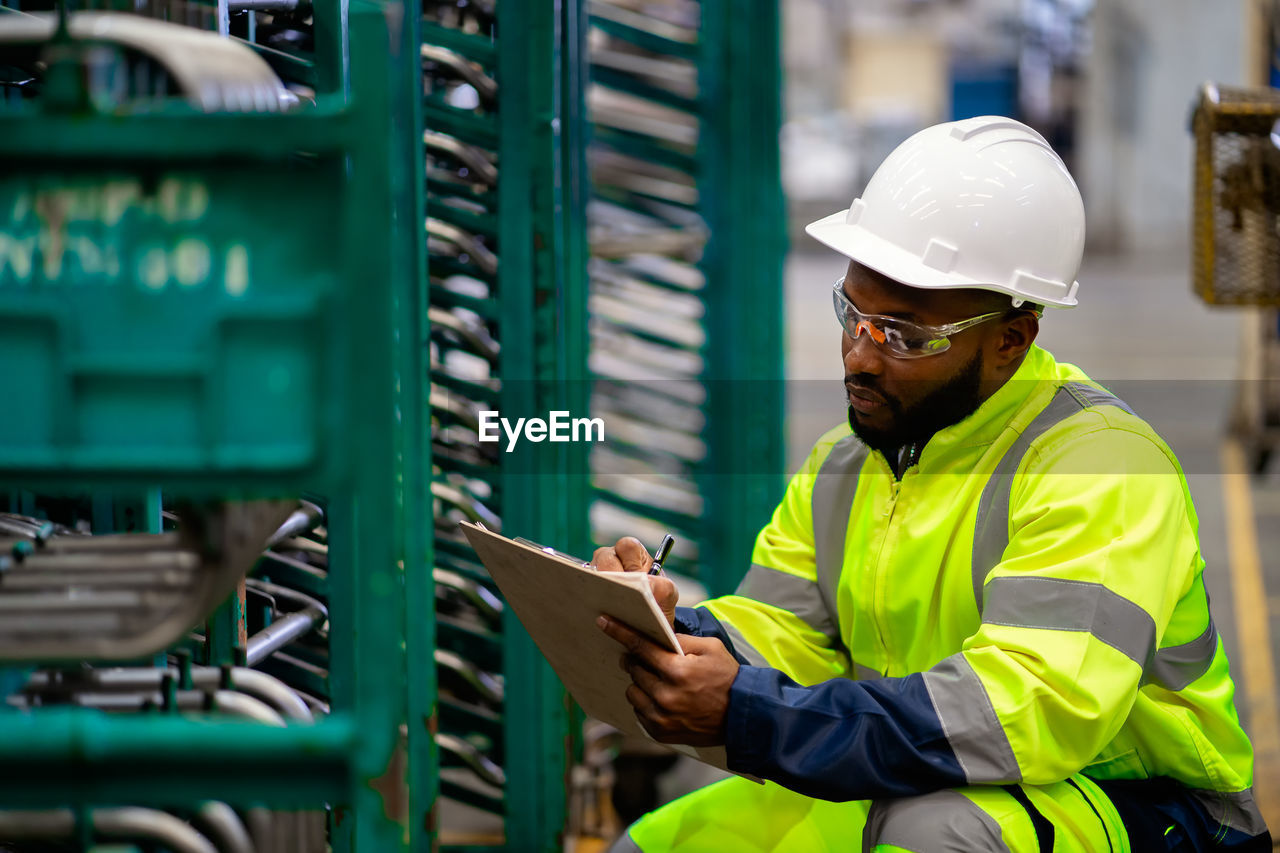 Engineer check stock in factory.