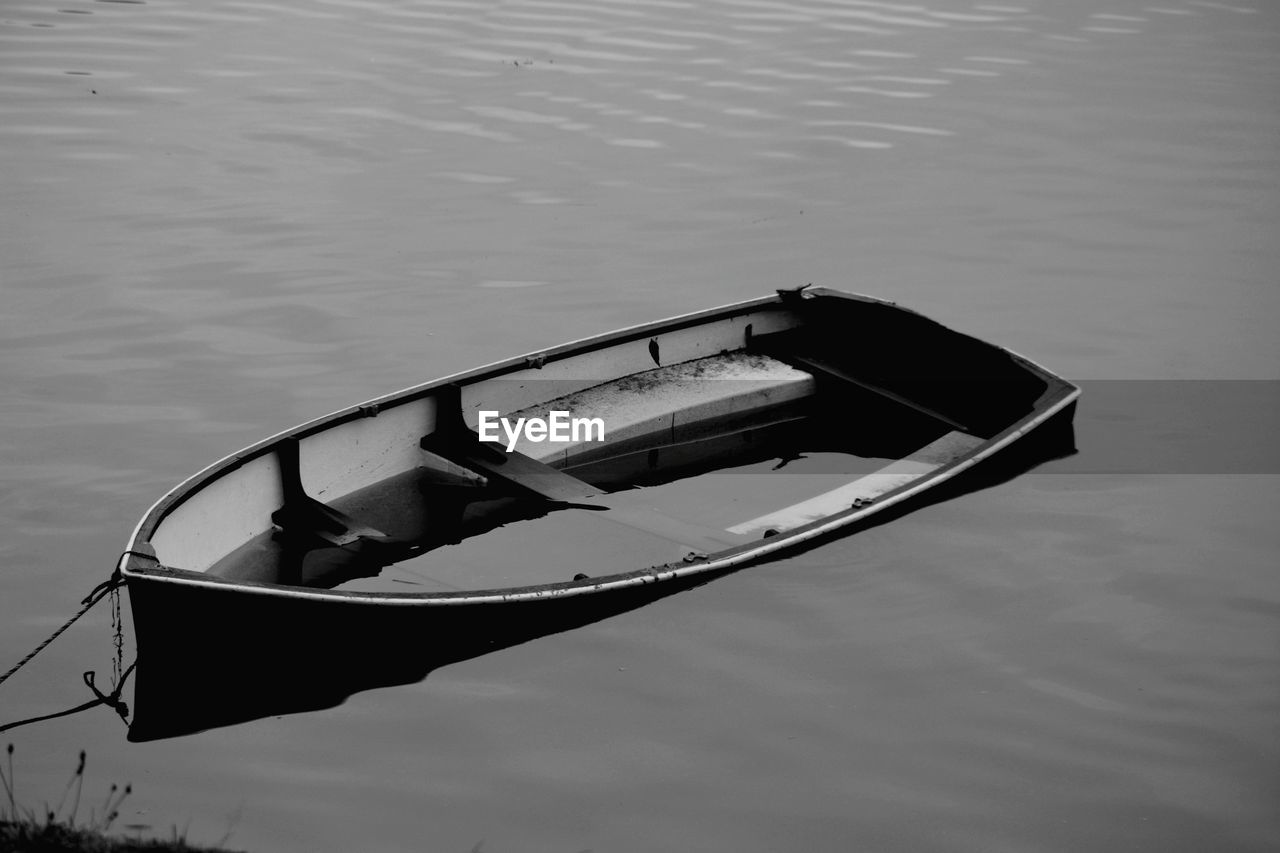 High angle view of boat moored in lake