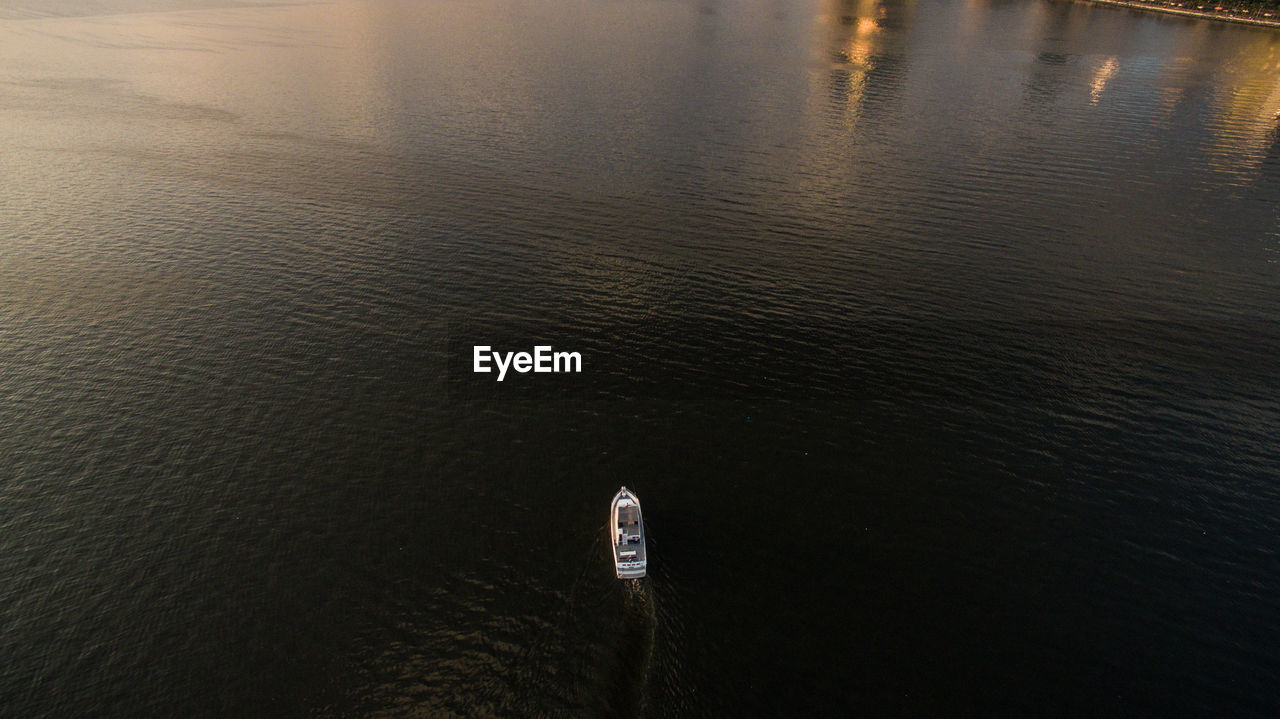 High angle view of ship sailing on sea