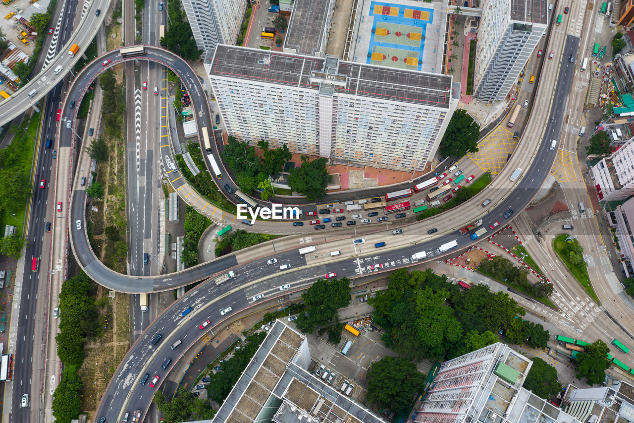 Aerial view of vehicles on road in city