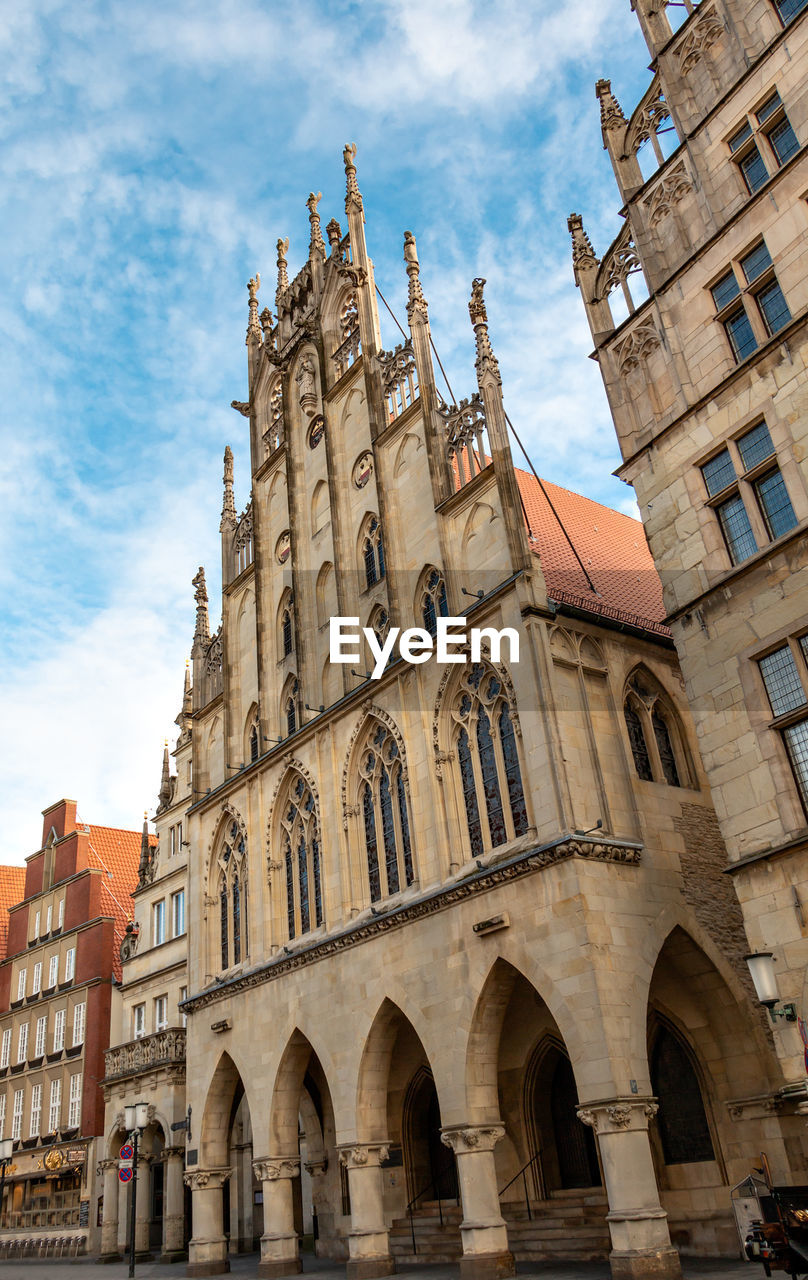 Low angle view of historic buildings against sky