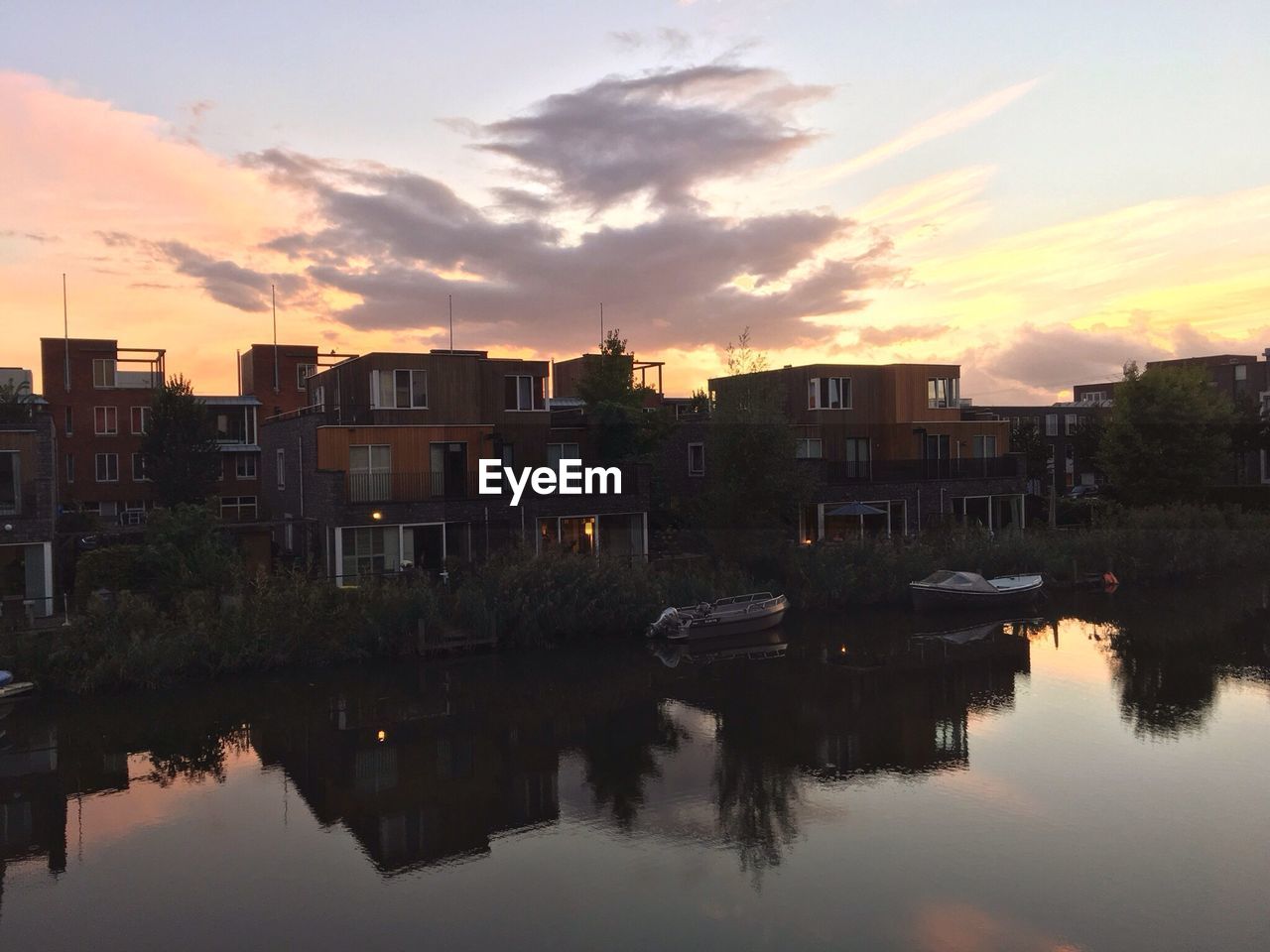 REFLECTION OF HOUSES IN CANAL