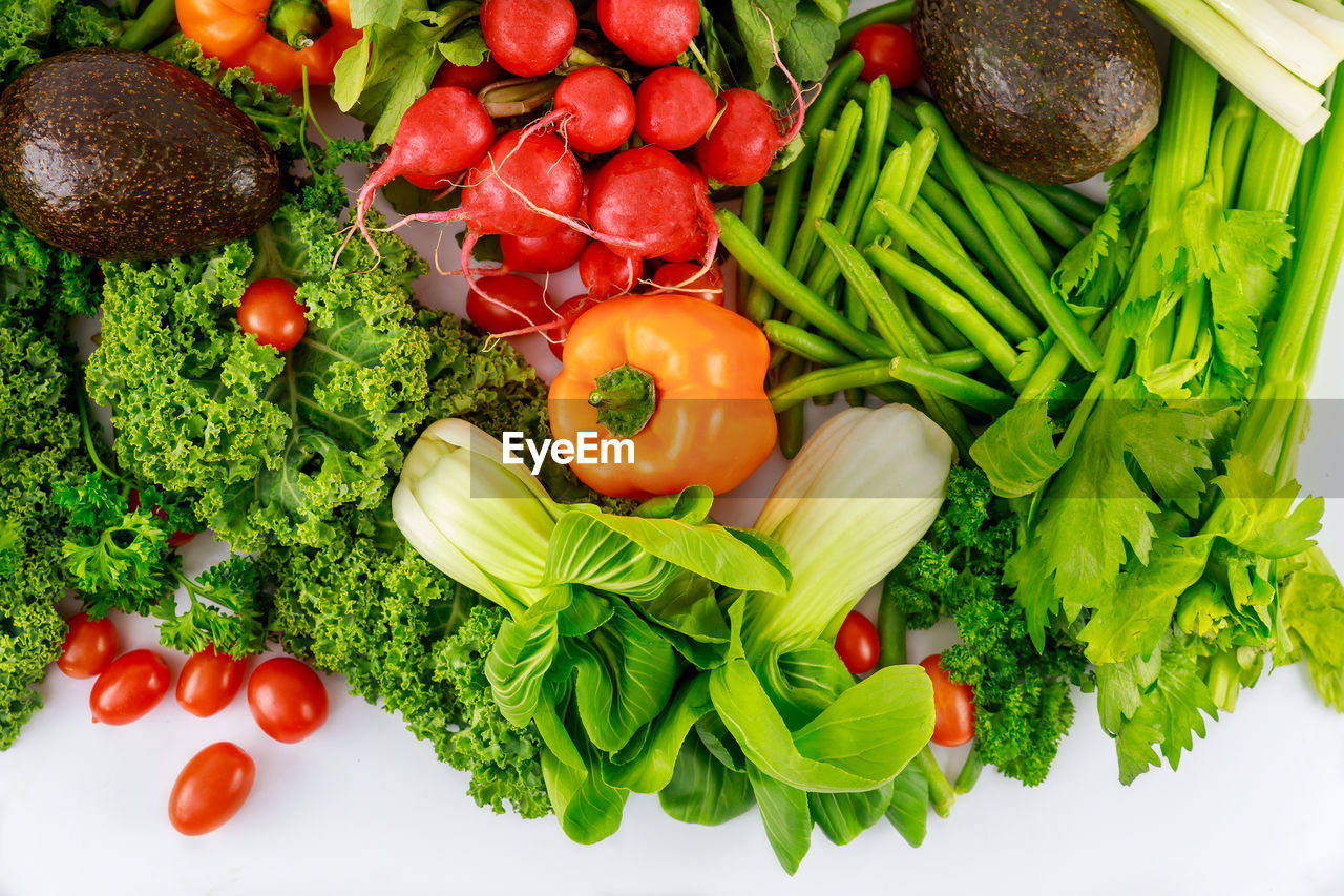 HIGH ANGLE VIEW OF FRUITS AND VEGETABLES IN CONTAINER