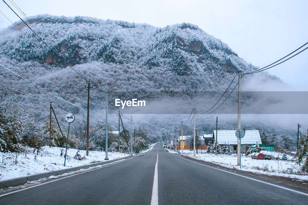 Road in winter overlooking the mountain