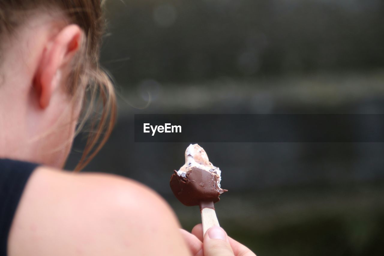 Close-up of woman holding ice cream