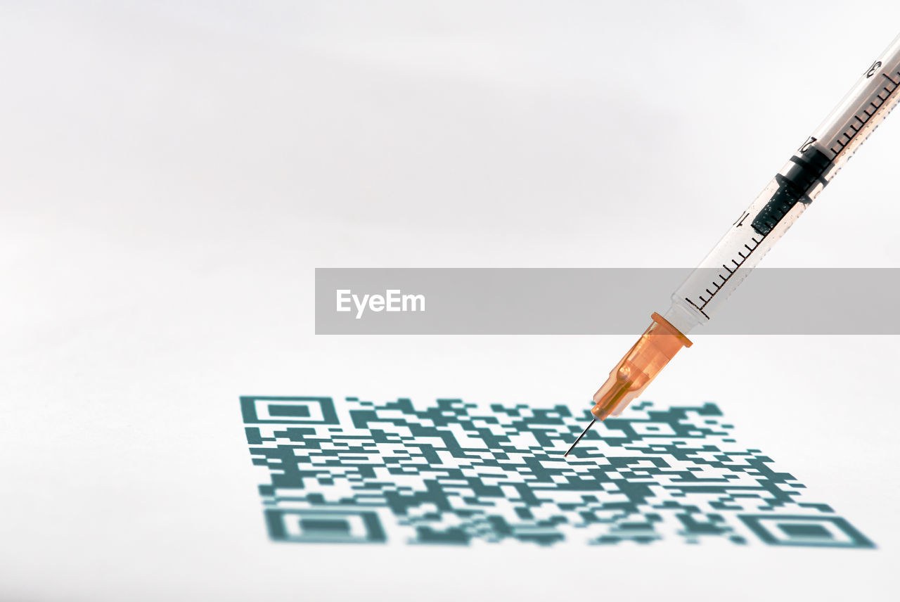 syringe, needle, healthcare and medicine, sharp, medicine, medical supplies, vaccination, studio shot, white background, indoors, no people, care, science, copy space, writing, illness
