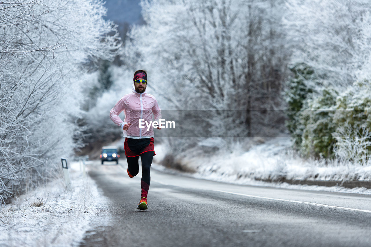 Man running on road