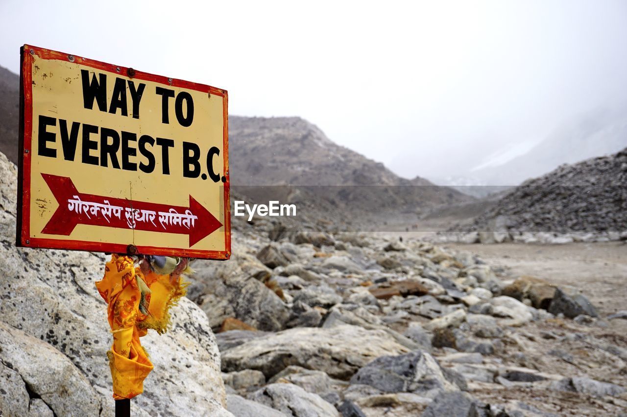 Classic traditional and colourful sign signposting the way to mount everest base camp