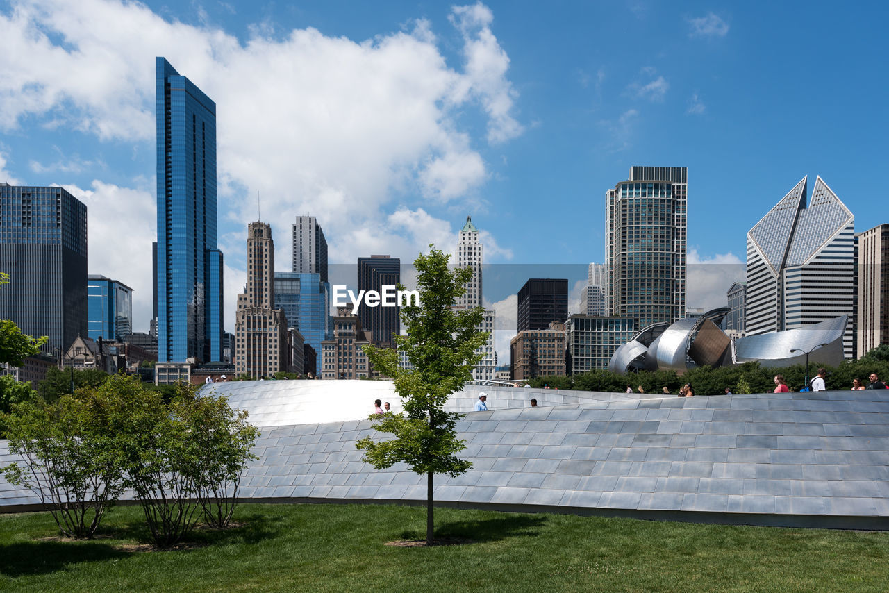 VIEW OF MODERN BUILDINGS AGAINST SKY