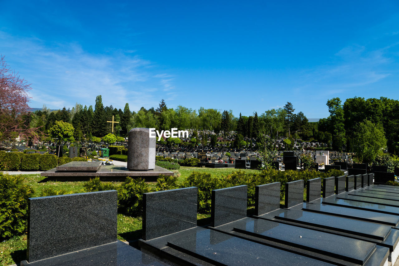 Tombstones at mirogoj cemetery against sky