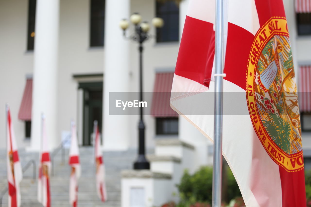 Close-up of florida state flag against building 