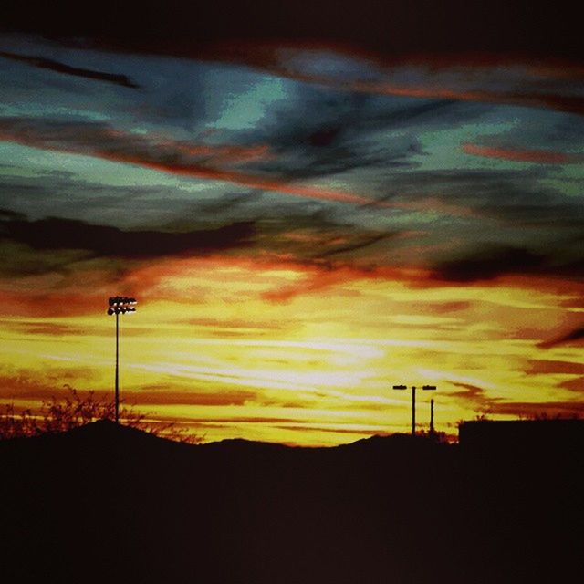 SUNSET OVER LANDSCAPE