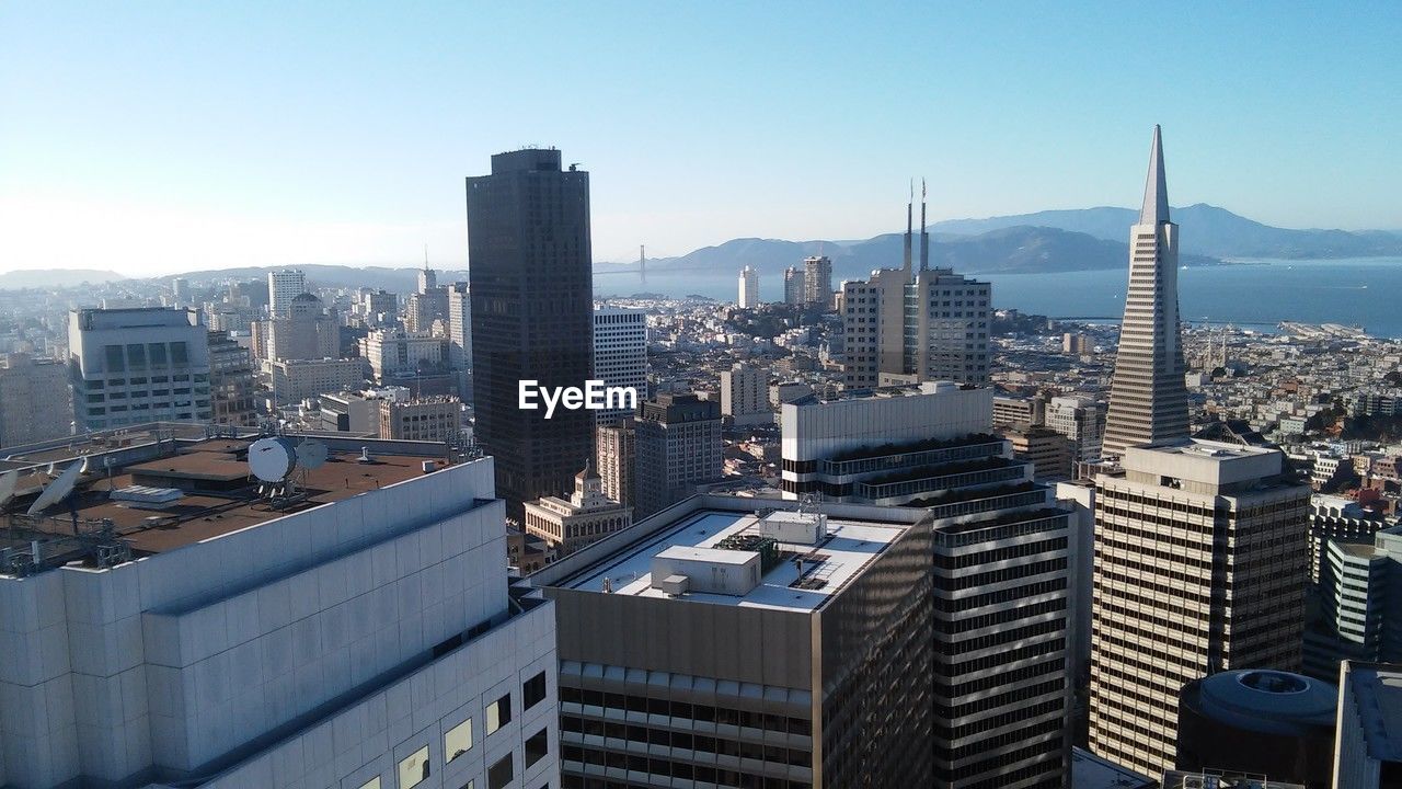 buildings in city against sky