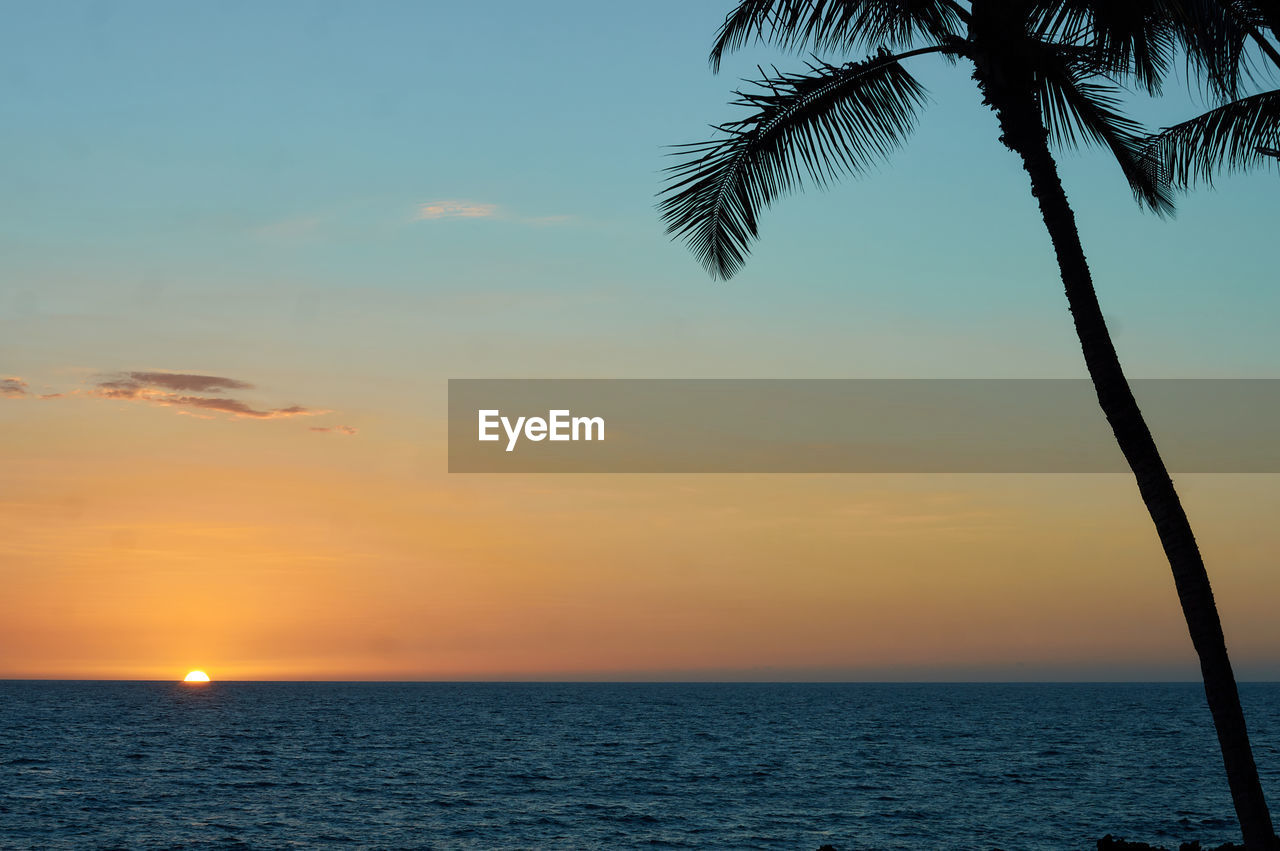 SCENIC VIEW OF SEA DURING SUNSET