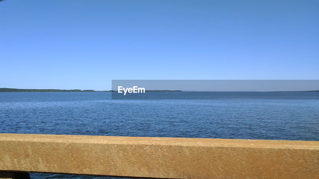 SCENIC VIEW OF SEA AGAINST BLUE SKY