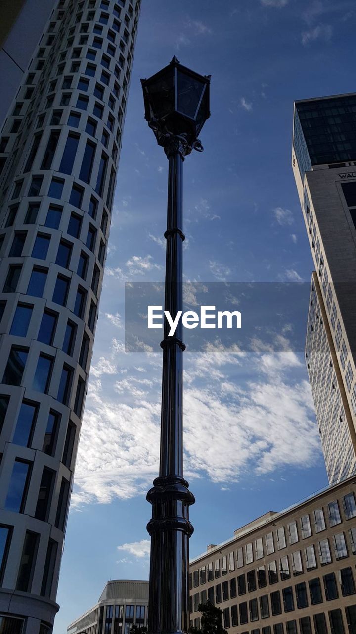 LOW ANGLE VIEW OF BUILDINGS IN CITY