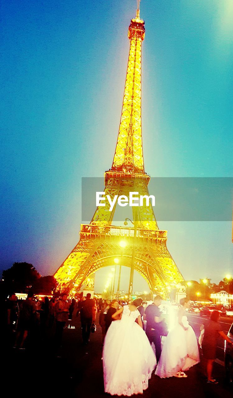 LOW ANGLE VIEW OF EIFFEL TOWER AT DUSK