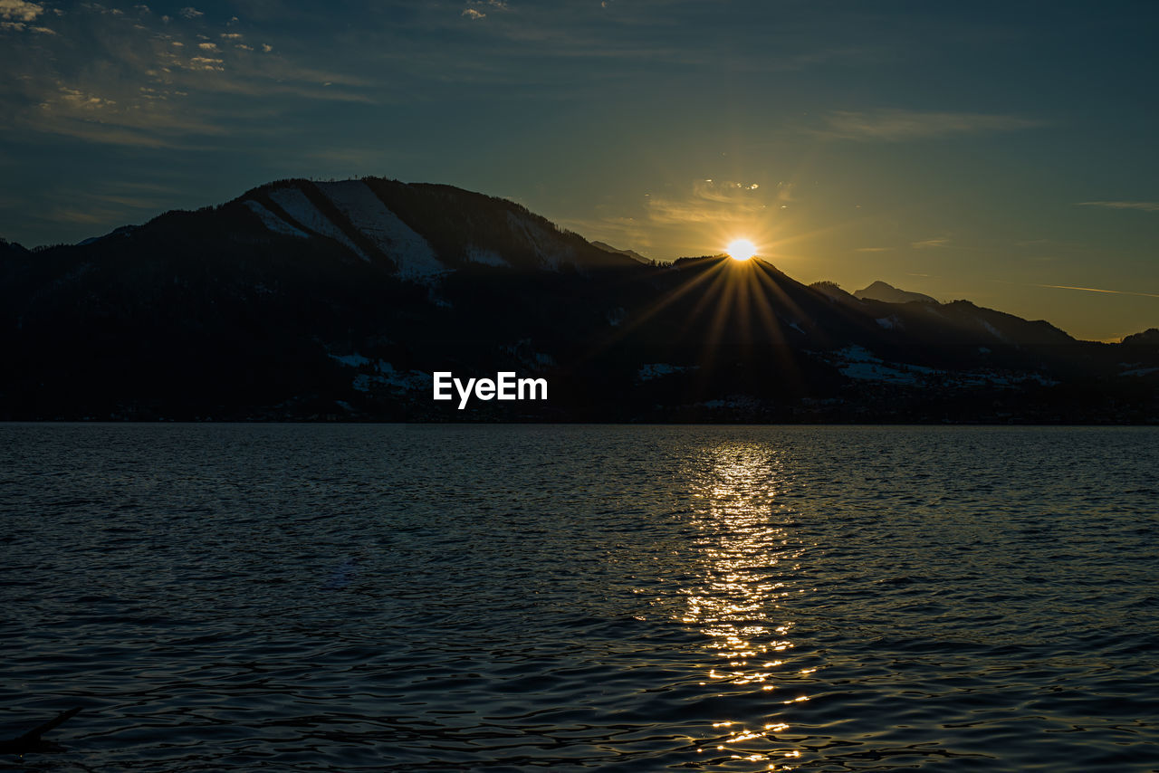 Scenic view of sea against sky during sunset