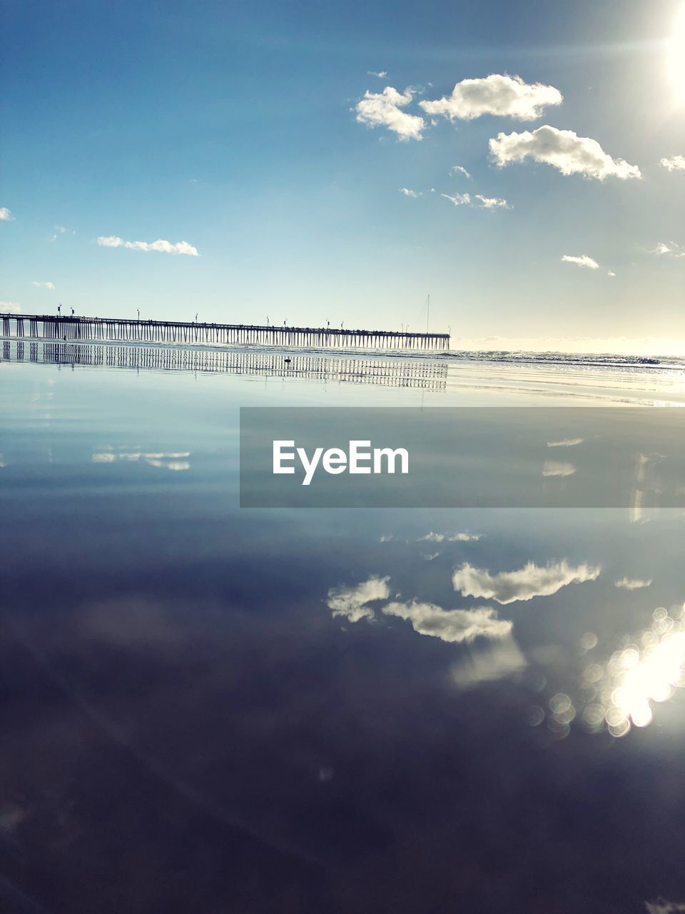 REFLECTION OF CLOUDS IN SEA