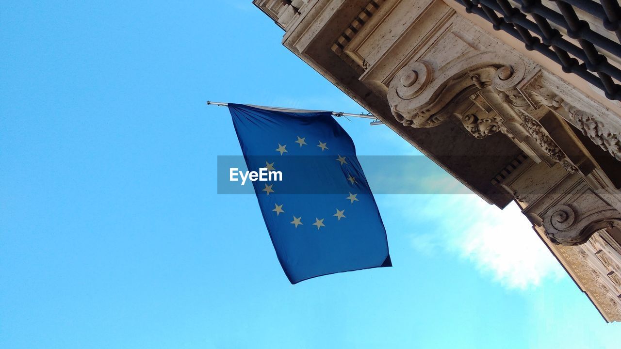 LOW ANGLE VIEW OF SIGN AGAINST SKY