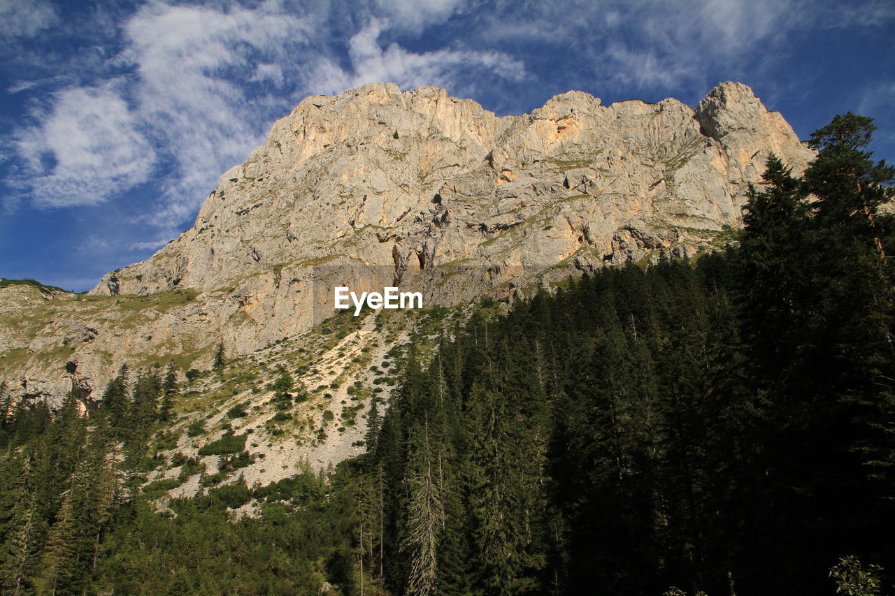 Scenic view of rocky mountains against sky