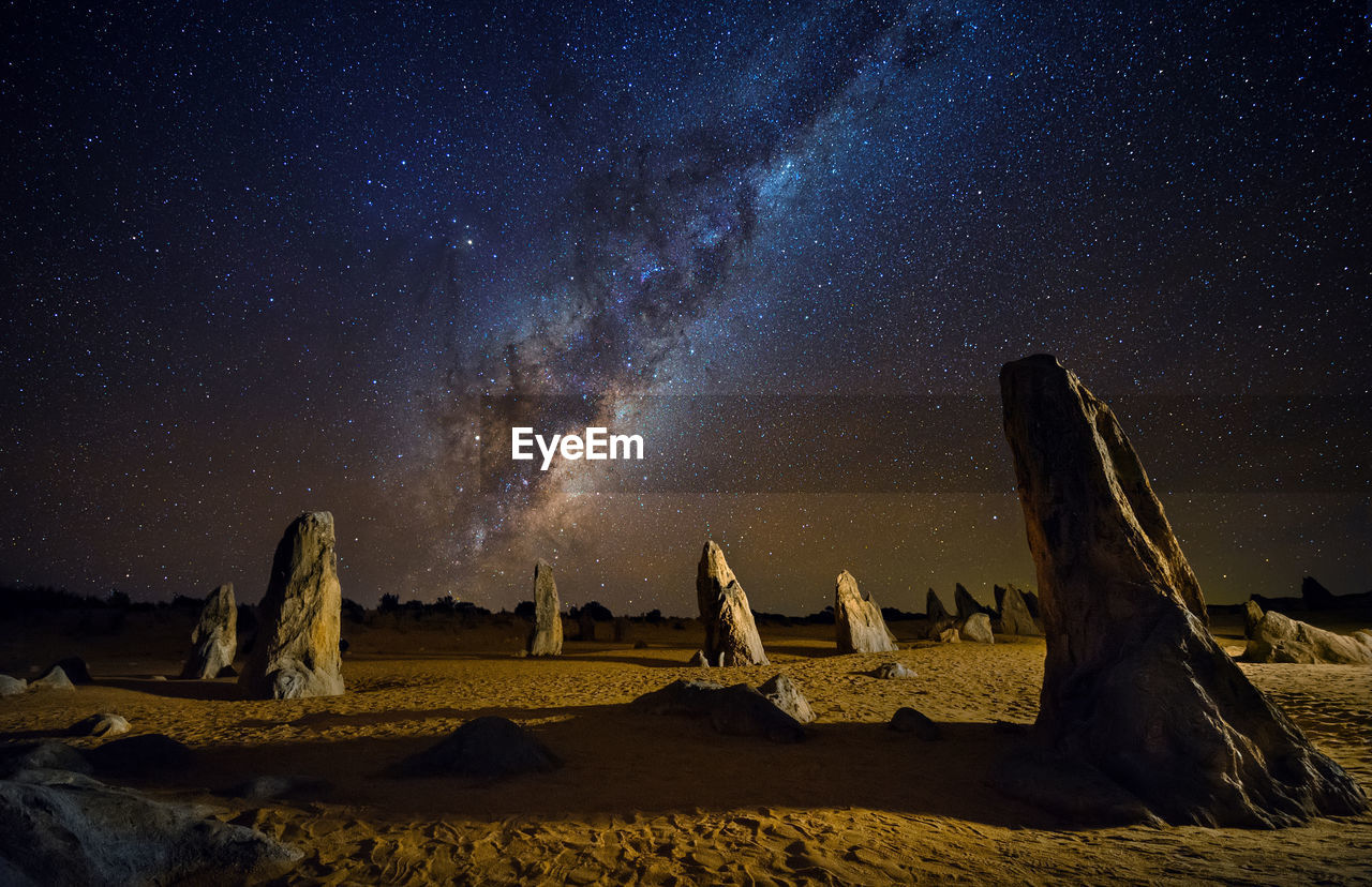 Scenic view of star field against sky at night