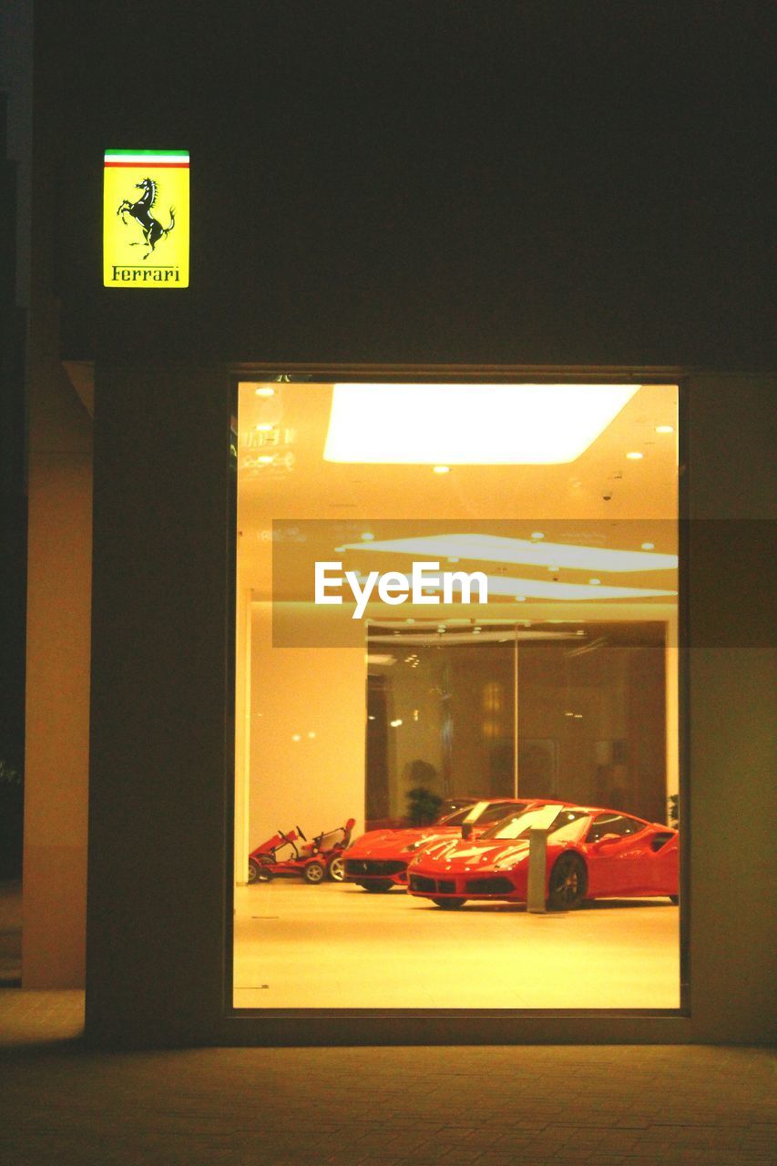 car, transportation, land vehicle, mode of transport, illuminated, night, built structure, no people, architecture, indoors, parking garage