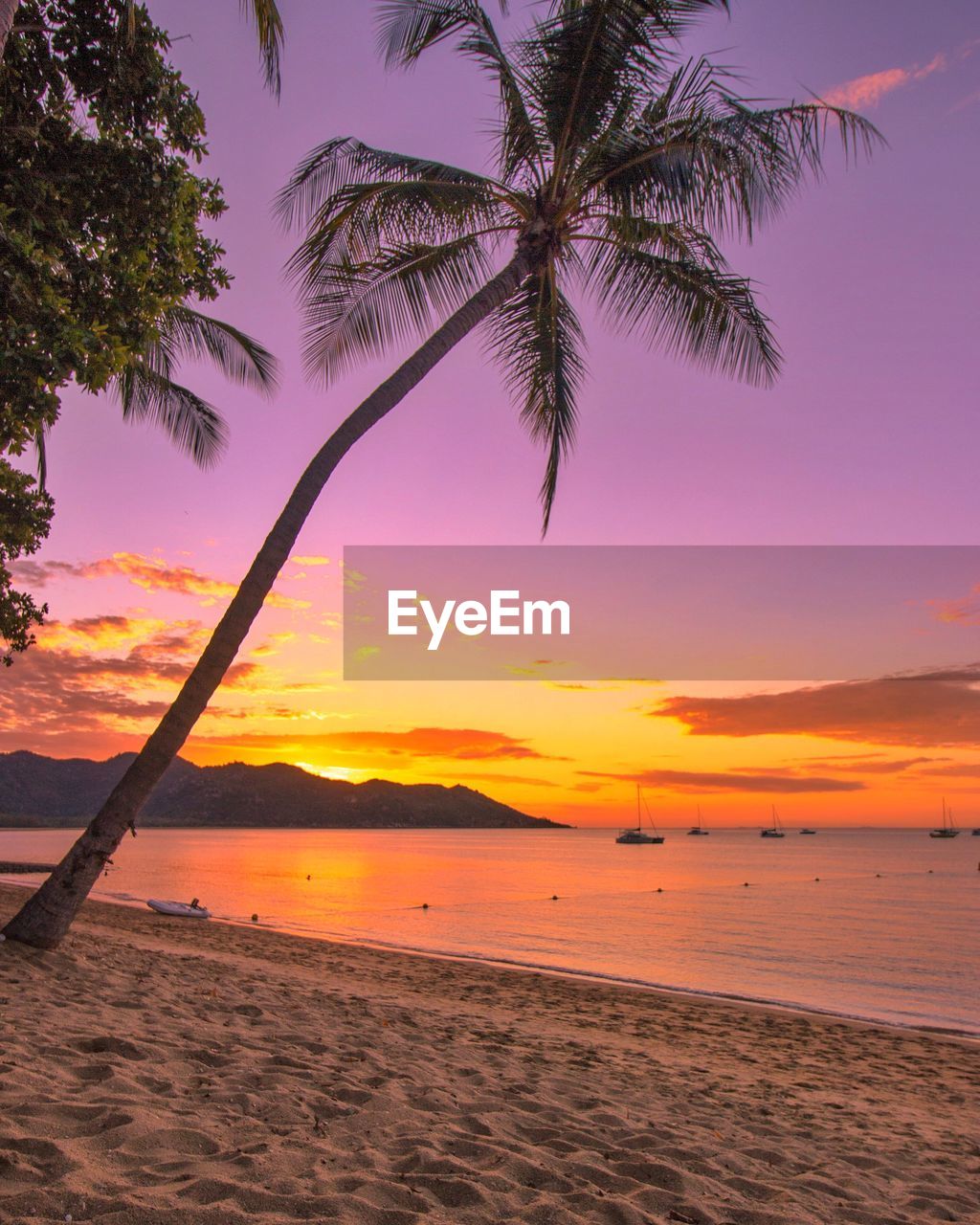 Scenic view of sea against sky at sunset