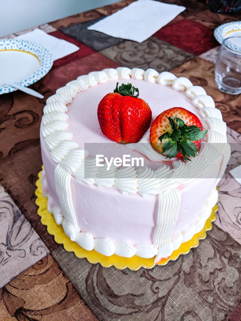 High angle view of strawberry cake on table