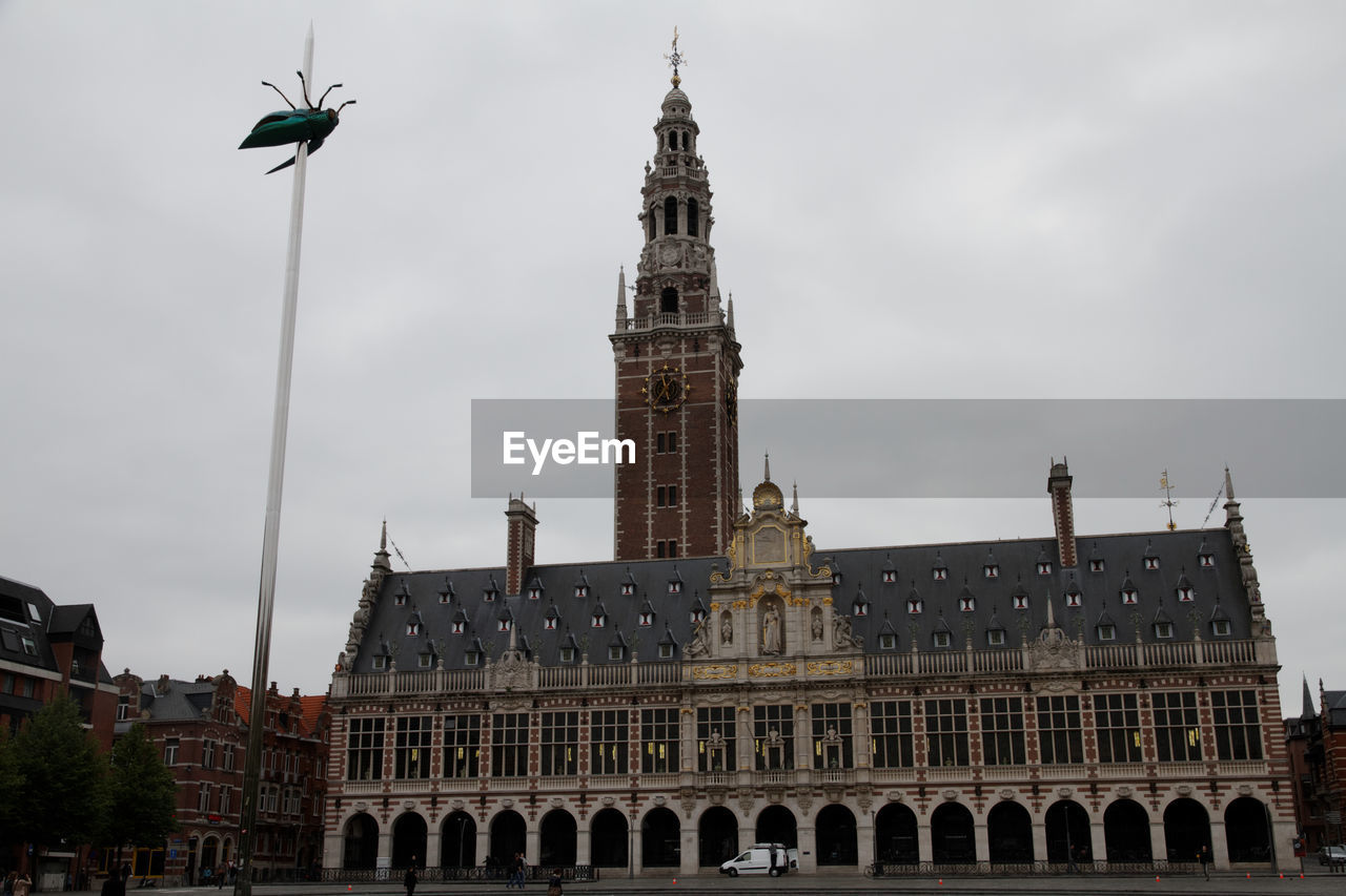 Low angle view of building against sky at leuven