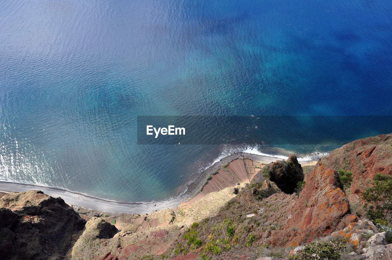 High angle view of sea seen from cliff