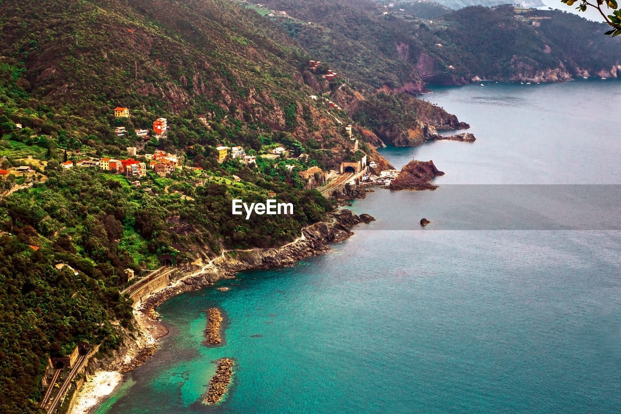 Aerial panoramic view of framura sea bay from hiking trail, liguria, italy