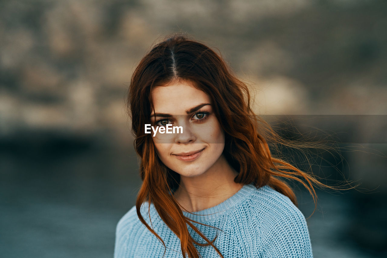 Portrait of smiling young woman