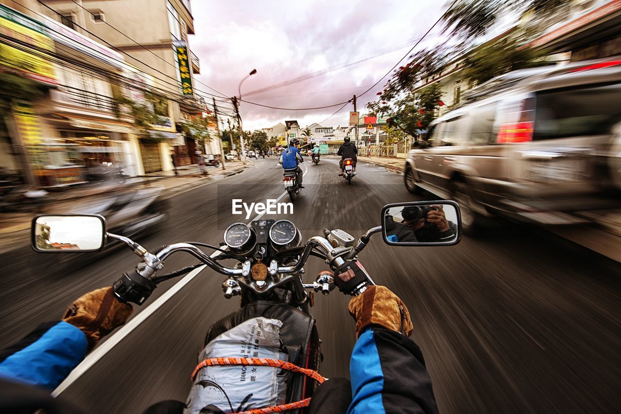 Close-up of cropped bike on road