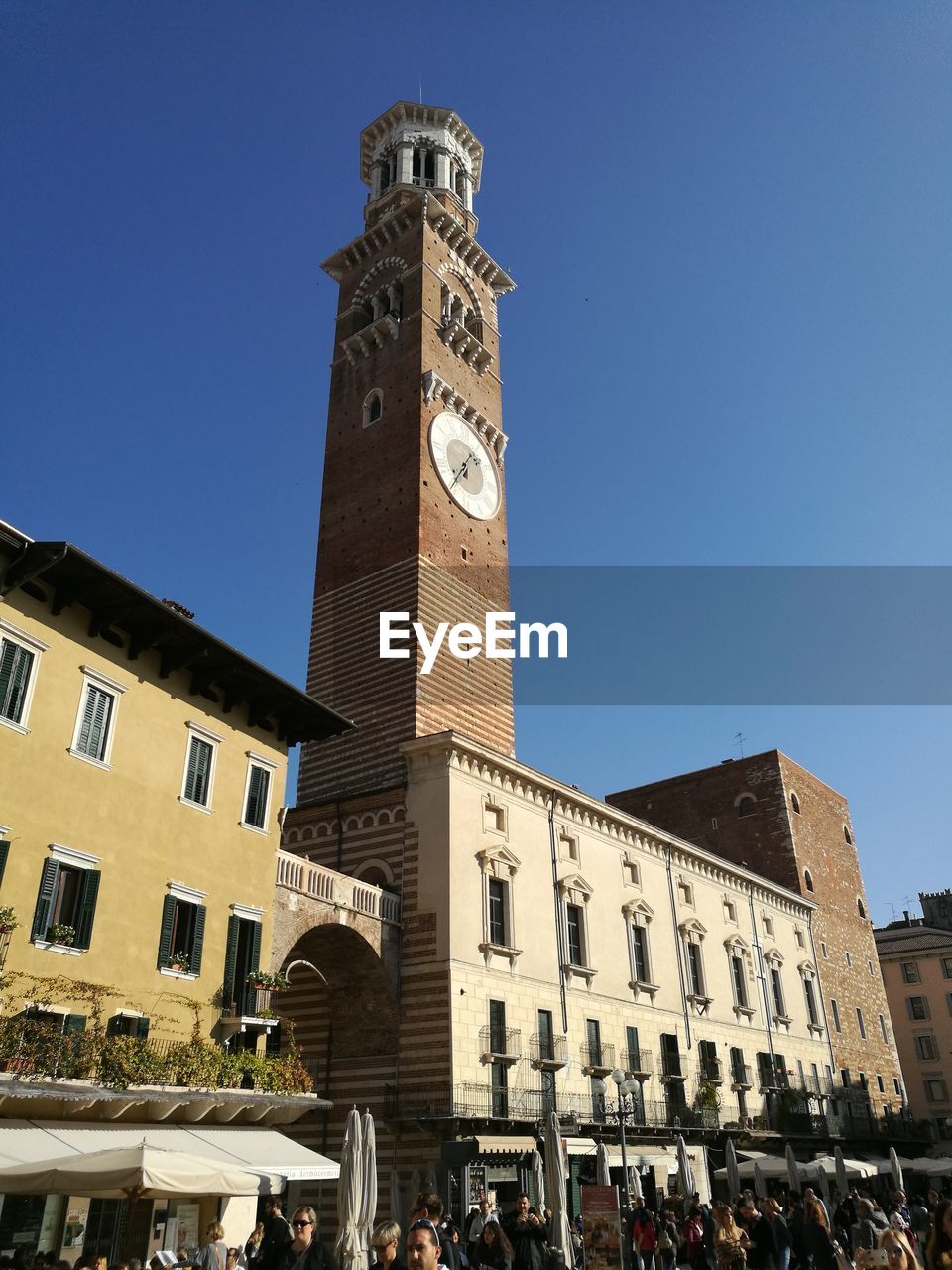 LOW ANGLE VIEW OF CLOCK TOWER AGAINST SKY